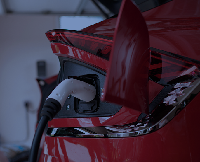 EV using smart charging in a residential garage at night